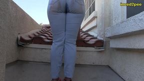 red august pee pee dancing and wetting herself on balcony