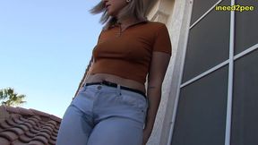 red august pee pee dancing and wetting herself on balcony