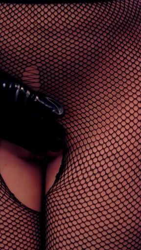 Captivating moment from &quot;Mistress in latex playing with rubber sissy sex doll&quot;
