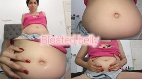 My swollen belly very close to you