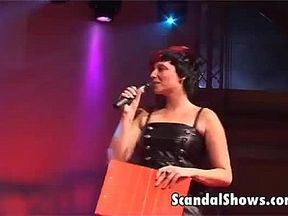 Busty blonde stripper dances