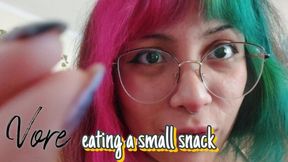VORE eating a small snack