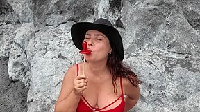 Stepmom Practices Sucking On A Candy On The Beach. Then Tests Her Skills On Her Stepsons Dick
