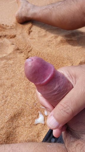 Ladysilva jerking off his big hot cock until he grasps on the deserted beach