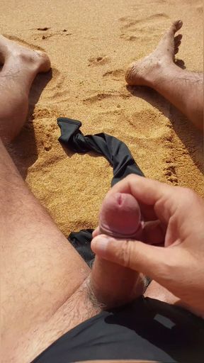 Ladysilva jerking off his big hot cock until he grasps on the deserted beach