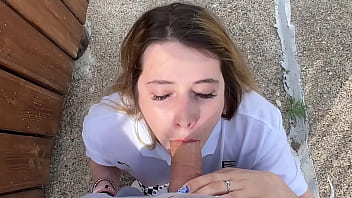 I give a young girlfriend a big dick in her mouth under a bridge in public