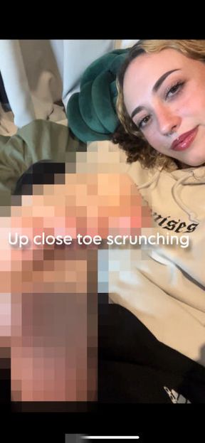 Toe scrunching close up