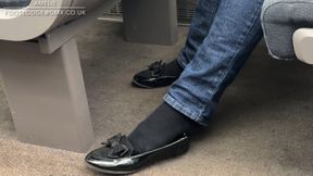 More candid shoeplay fun on the train