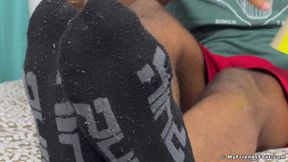 Black jock Dallas shows off his size 12 feet in dirty socks