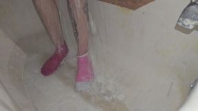 Chrissy unaware showering in socks