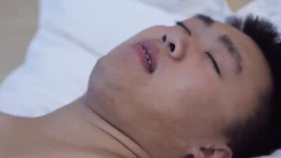 Chubby Asian dude gets horny and pushes dildo up his ass
