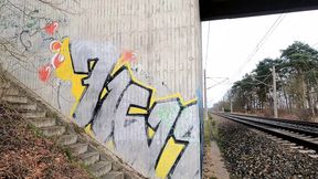 Slapping her naked tits and ass near railway