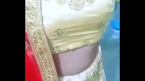 Indian Gay Crossdresser Bottom Gaurisisy feeling horny and pressing and playing with her big boobs in golden lehanga