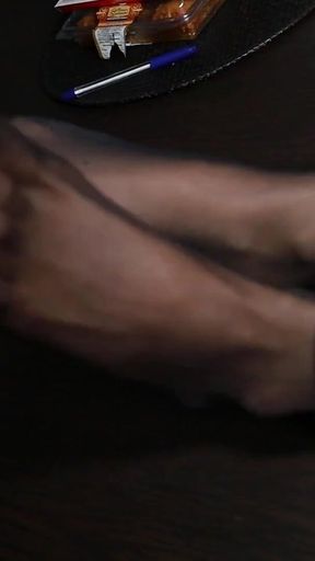 Shy Secretary Kerry Displays Her Nylon Feet on the Table