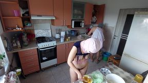 Crazy amateur couple having fun in the kitchen.