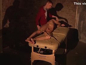 Tied up twinkie receives a blowjob and tugjob from master