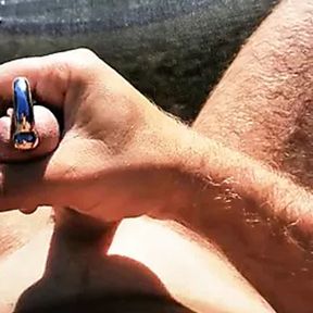 Cumshot on a gardenlounger