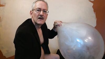 Naughty stepdad Jack is having fun with a huge balloon