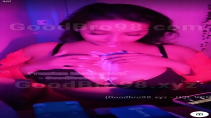 BIG BOOBIE GIRL DOING STRIPTEASE AND SUCKING LIPSTICK