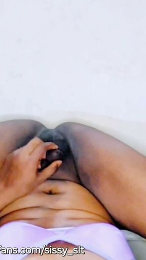 Tiny penis ebony sissy shemale try to piss on own mouth   Clip 1