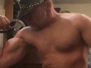 Naked horny muscular cop wearing his police hat turns himself on flexing his big bicep and cums