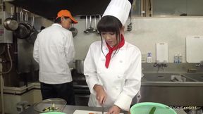The chef and restaurant management reprimand the Asian cook by instructing her to squeeze thick veggies