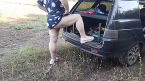 girlfriend squirts several times in a row in a public place near the car