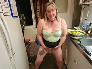NZ MILF slut kicked in the cunt several times before pissing on the floor