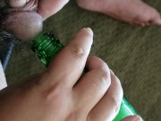 Small cock pissing into bottle - urination