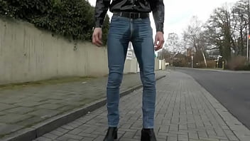 wetting tidy jeans on the street