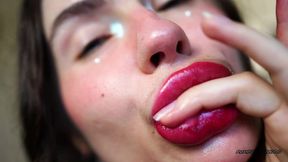wet red sticky lipgloss kiss