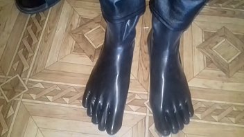 putting on black rubber socks