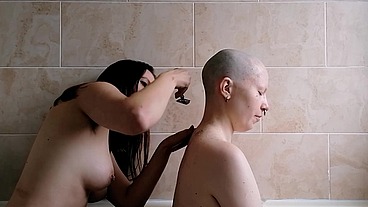 The second half of this head shave with scarlotrose . She uses the safety razor to get my had super smooth while we keep chat...