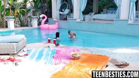 Petite teens enjoy lesbian pool party fun with a third girl