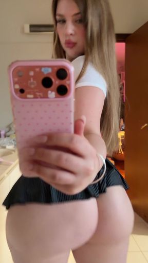 Curvy girl claps her cheeks in a playful performance