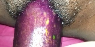 Bangladeshi girl gets excited and fucks her pussy with eggplant