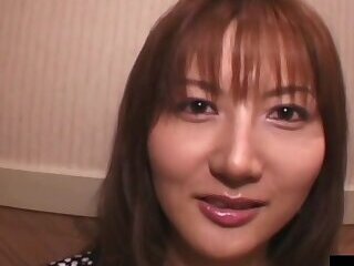 A woman responding to an interview, excited when seen.