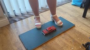 Giantess Lou crushes a 1957 Chey bel air in white chucky heels high left view