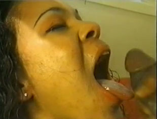Curly haired ebony whore deepthroats my cock like a pro