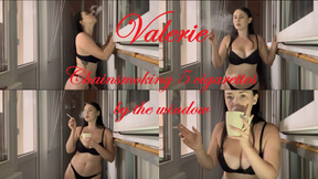 Chainsmoking 5 cigarettes by the window