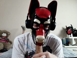 Latex puppy sucks his rubber bone. See the full on my Fancentro