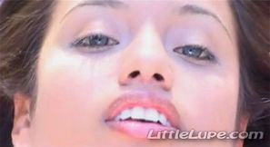 Little Lupe masturbates on the wet grass