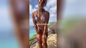 Teen girl leaks her pussy juices on the sandy beach