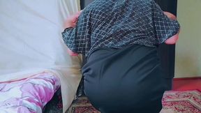 Stunning femboy adjusting skirt in front of mirror
