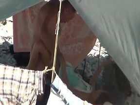 Mature nudists have hardcore sex inside of their tent