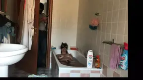 Italian girl masturbates in the tub and her husband films her with his cell phone