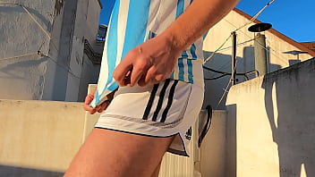 Football player enjoys his sexy, soft, shiny uniform covering his sexy body and dick