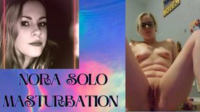 Sexy blonde masturbates with glass dildo
