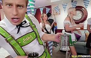 Two girls grab some intense sausage on Octoberfest