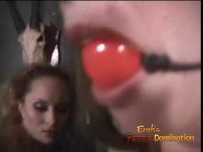 Latex lezdom whipping brunette sub while ball gagged